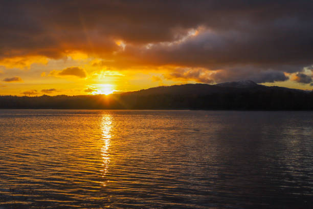istock Golden sunset over lack Windermere 1351353797