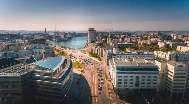 Photo of Aerial view. Helsinki seaside with view on hotels, offices, port and shipyard. Finland