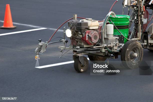 Marking Machine Painting Parking Lot Lines Stock Photo - Download Image Now - Parking Lot, Painting - Activity, Dividing Line - Road Marking