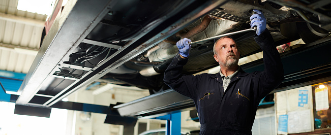 mature garage mechanic