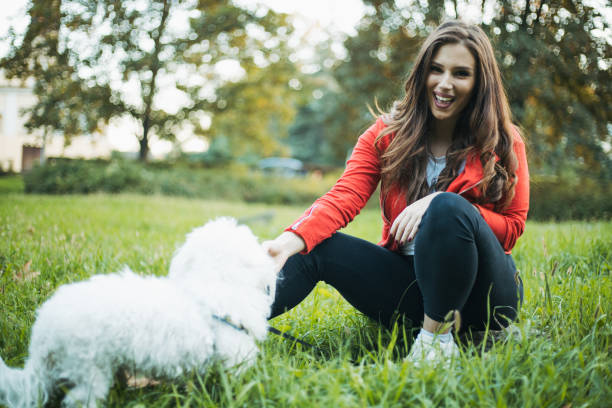 istock woman with dog 1351365306