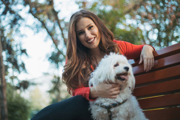 istock woman with dog 1351365351