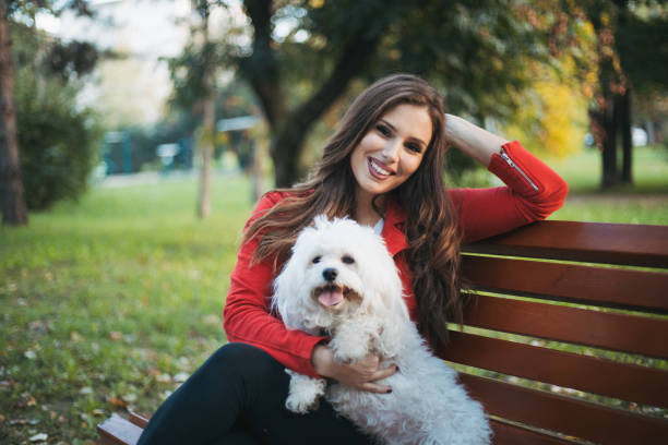istock woman with dog 1351365354