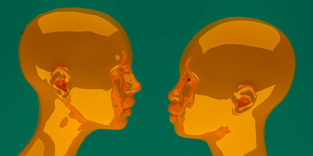 istock 3D render depicting two gold-colored human heads 1351366074