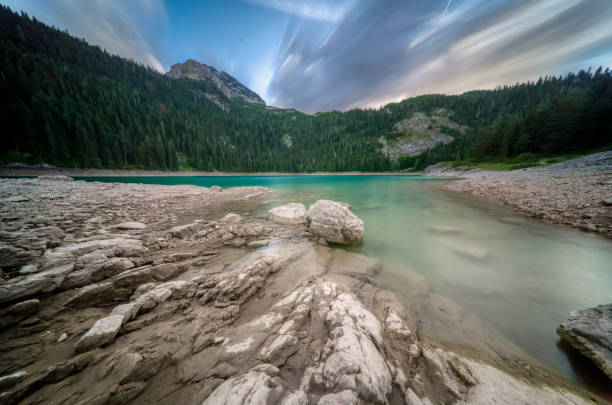 istock Dramatic colorful skies and light at a popular hiking area,featuring mount Durmitor with glacial landscapes and terrain,in the late summer,high in the mountains of northwest Montenegro. 1351366236
