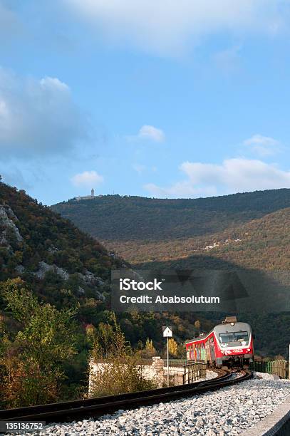 Red Train On So269a Bridge Slovenia Stock Photo - Download Image Now - Architecture, Autumn, Blue