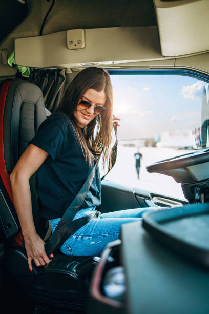 istock Professional female truck driver working 1351369502