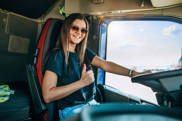 istock Professional female truck driver working 1351369506