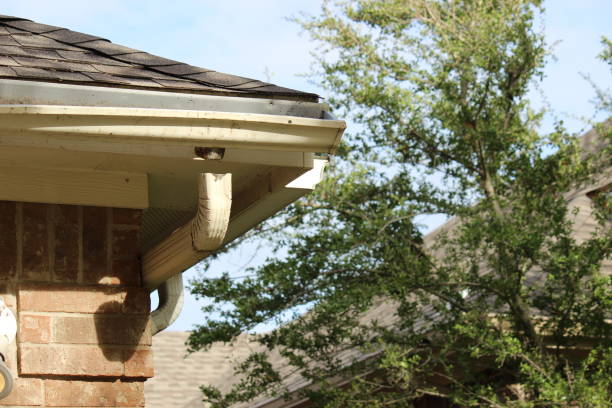 istock Broken Gutter Downspout in a residential house in North Texas 1351370246
