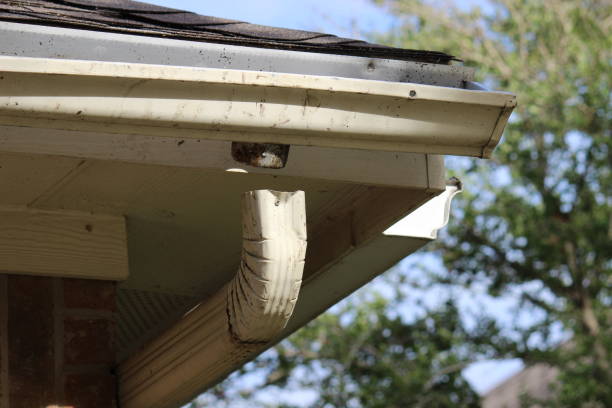 istock Broken Gutter Downspout in a residential house in North Texas 1351370295