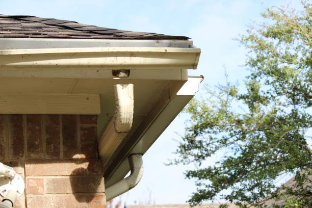 istock Broken Gutter Downspout in a residential house in North Texas 1351370299