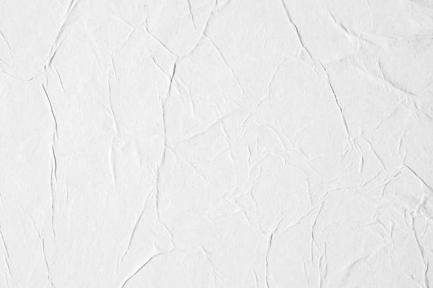 istock white crumpled and creased paper poster texture background 1351370561