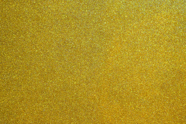 istock Abstract gold glitter sparkle bokeh light background 1351372324