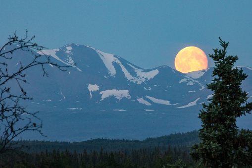 The June super moon rose over the Chugach mountain range of Alaska