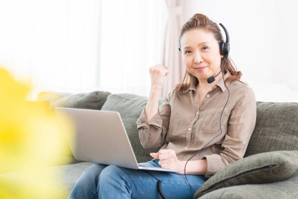 istock senior age woman studying with a PC,correspondence course 1351381209