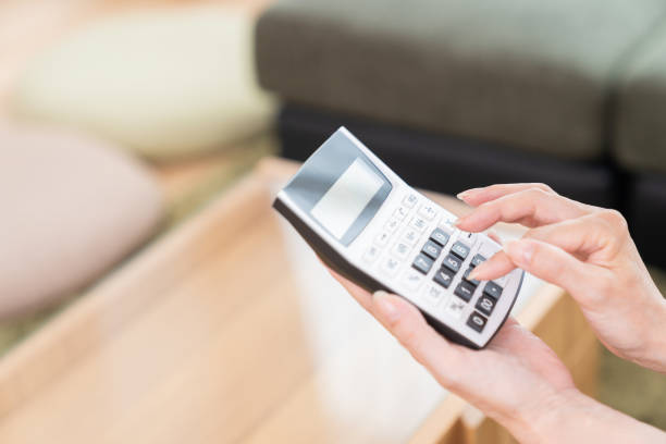 istock senior age woman having an electronic calculator 1351381252
