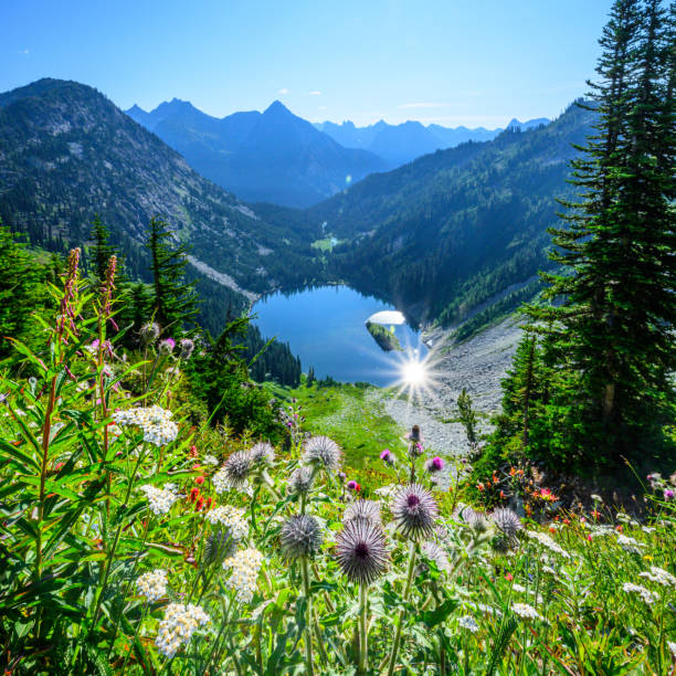 Sun Burst Reflects in Lake Ann in North Cascades Wilderness