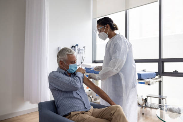 istock Senior man getting the COVID-19 vaccine 1351390867