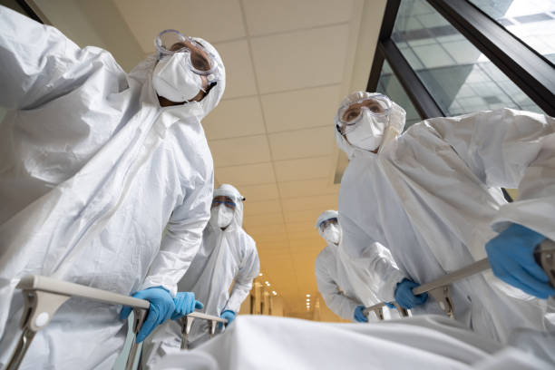 istock Frontline workers at the hospital taking a patient to the ICU 1351391216