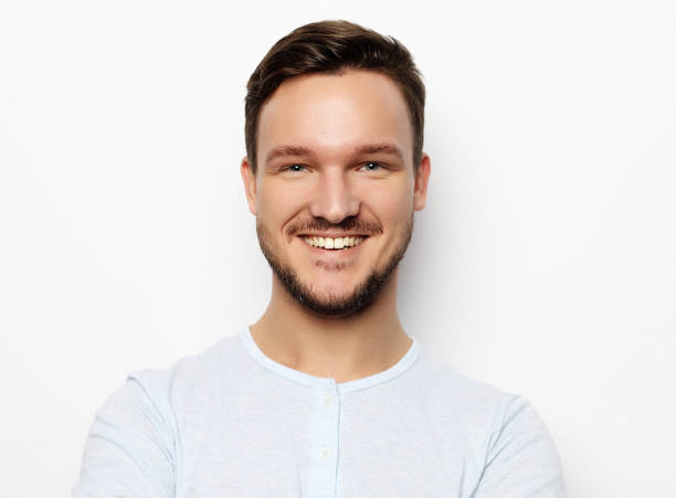 istock Handsome young man in smart casual wear looking at camera 1351400138