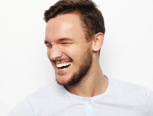 istock portrait of a young man surprised face expression 1351400152