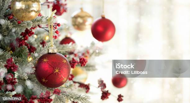 Christmas Tree In Front Of A Window Stock Photo - Download Image Now - Christmas, Backgrounds, Christmas Ornament