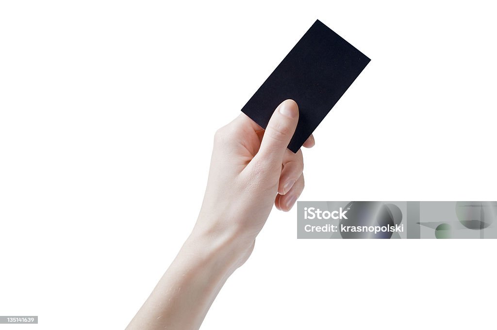 Hand Holding a Business Card Female hand holding a black card. Blank Stock Photo