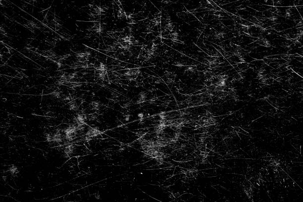 istock scratches isolated on a black background. template for design 1351417373