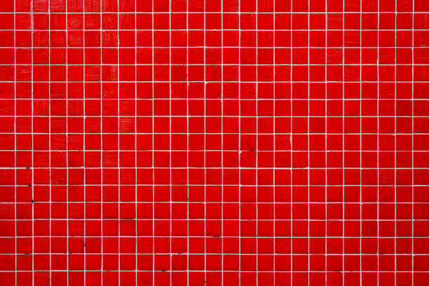 Wall made of red mosaic tiles stock photo