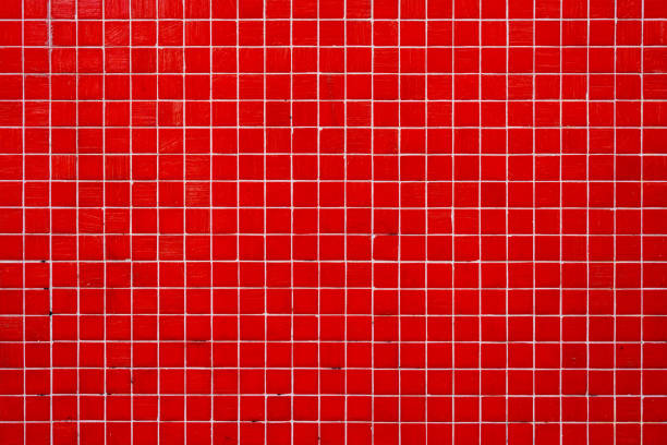 Wall made of red mosaic tiles Background from a wall made of red mosaic tiles red brick tile stock pictures, royalty-free photos & images
