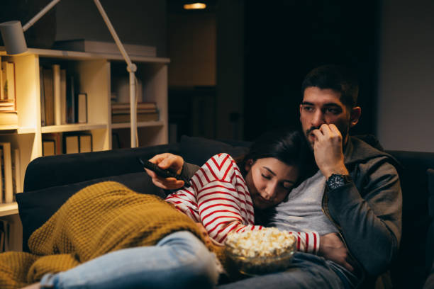 istock Couple relaxing at home. night scene 1351418533