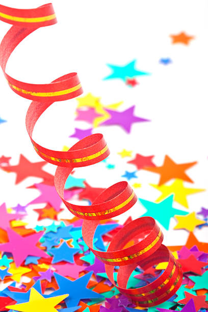 istock Multicoloured confetti stars and red streamer 135141859