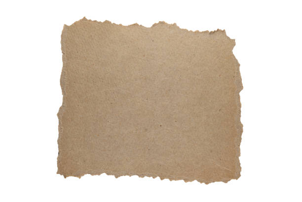 istock Brown old cardboard torn and isolated on white background. 1351425329