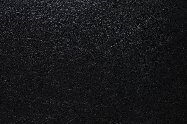istock The texture of the dark artificial leather dermantin. 1351425346