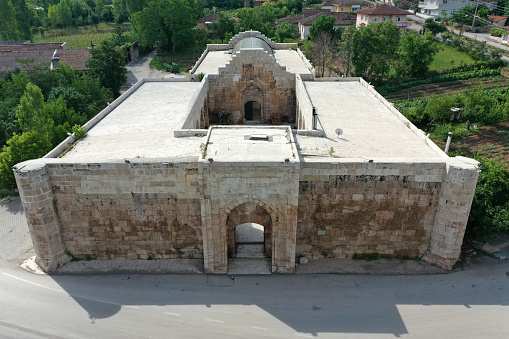Tokat, Turkey - June 24, 2021: Mahperi Hunad Hatun Caravanserai is located in Pazar district. The caravanserai was built in 1238 during the Anatolian Seljuk period.