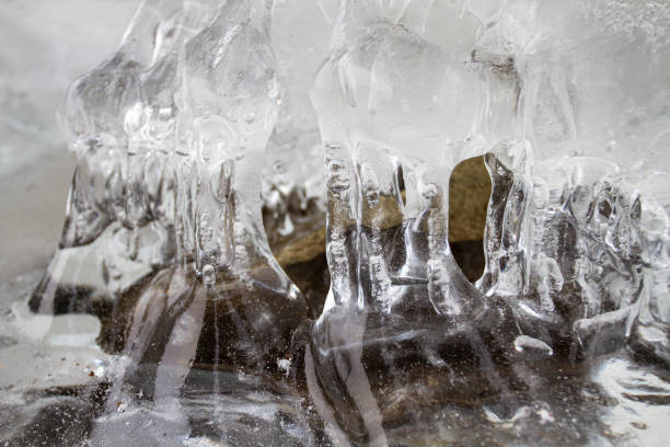 istock transparent ice covers the stone 1351429843