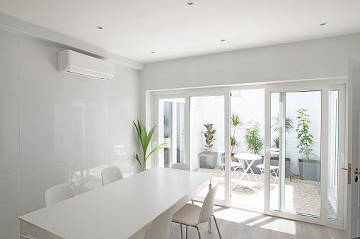 Kitchen dining area leading to internal light well courtyard