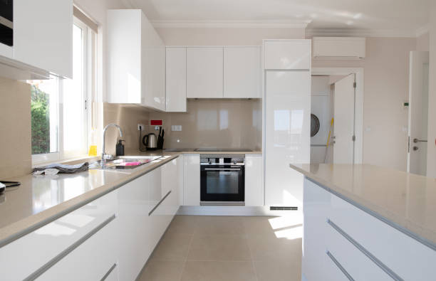 istock Brand new modern kitchen with white cabinets 1351431356
