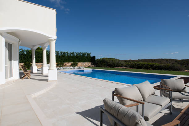 istock Large swimming pool in the garden 1351431368