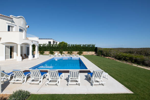 istock Large swimming pool in the garden 1351432336