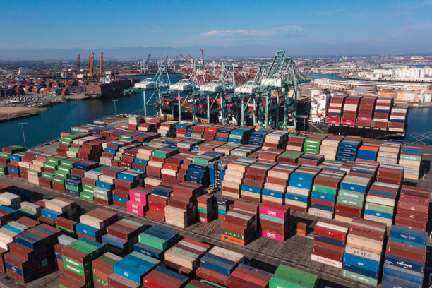 port of san pedro in los angeles ca with san vicente bridge in the long beach area with shipping containers stuck at harbor - sea commercial dock harbor bay imagens e fotografias de stock