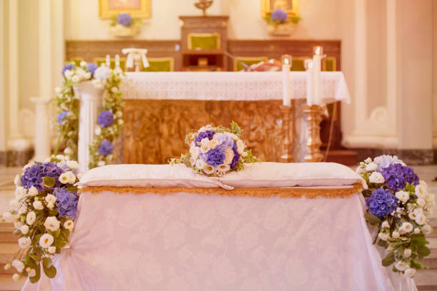 istock Wedding bouquet over the grooms bench 1351436829
