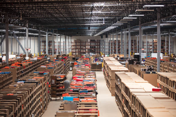 istock Long Exposure View of Pickers Working in Distribution Center 1351437637