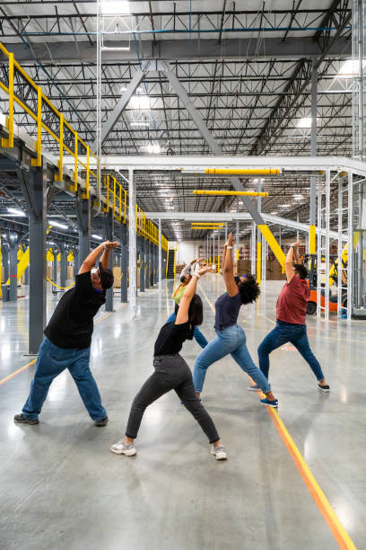 istock Yoga Routine for Employees at Fulfillment Center 1351437789
