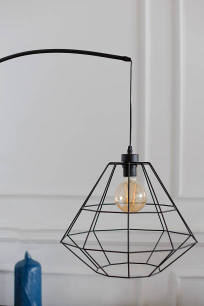 istock Closeup retro style bulb lamp, Loft style interior decoration. 1351443588