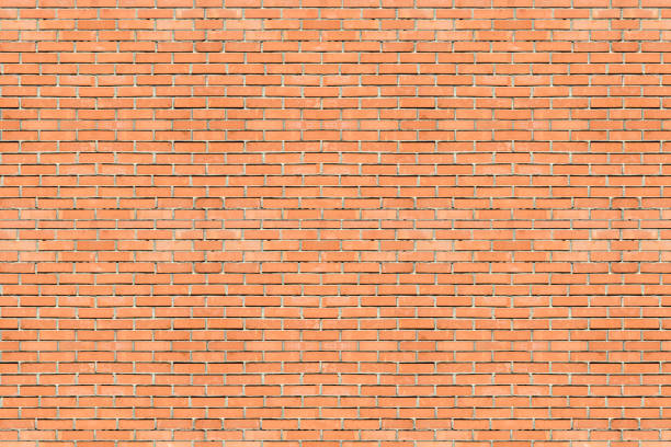 istock red, orange brick wall, brick background for design 1351443747