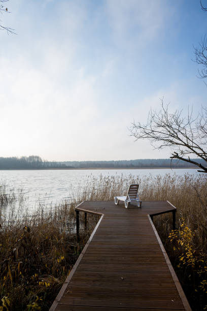 istock an empty beach chair on the pier . High quality photo 1351444925