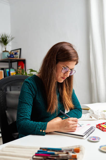 istock Illustrator woman teleworking in home office 1351445257