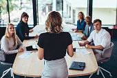 istock Businesswoman addressing a meeting in office 1351446226