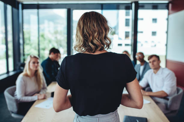 istock Office manager having a meeting with her staff 1351446286